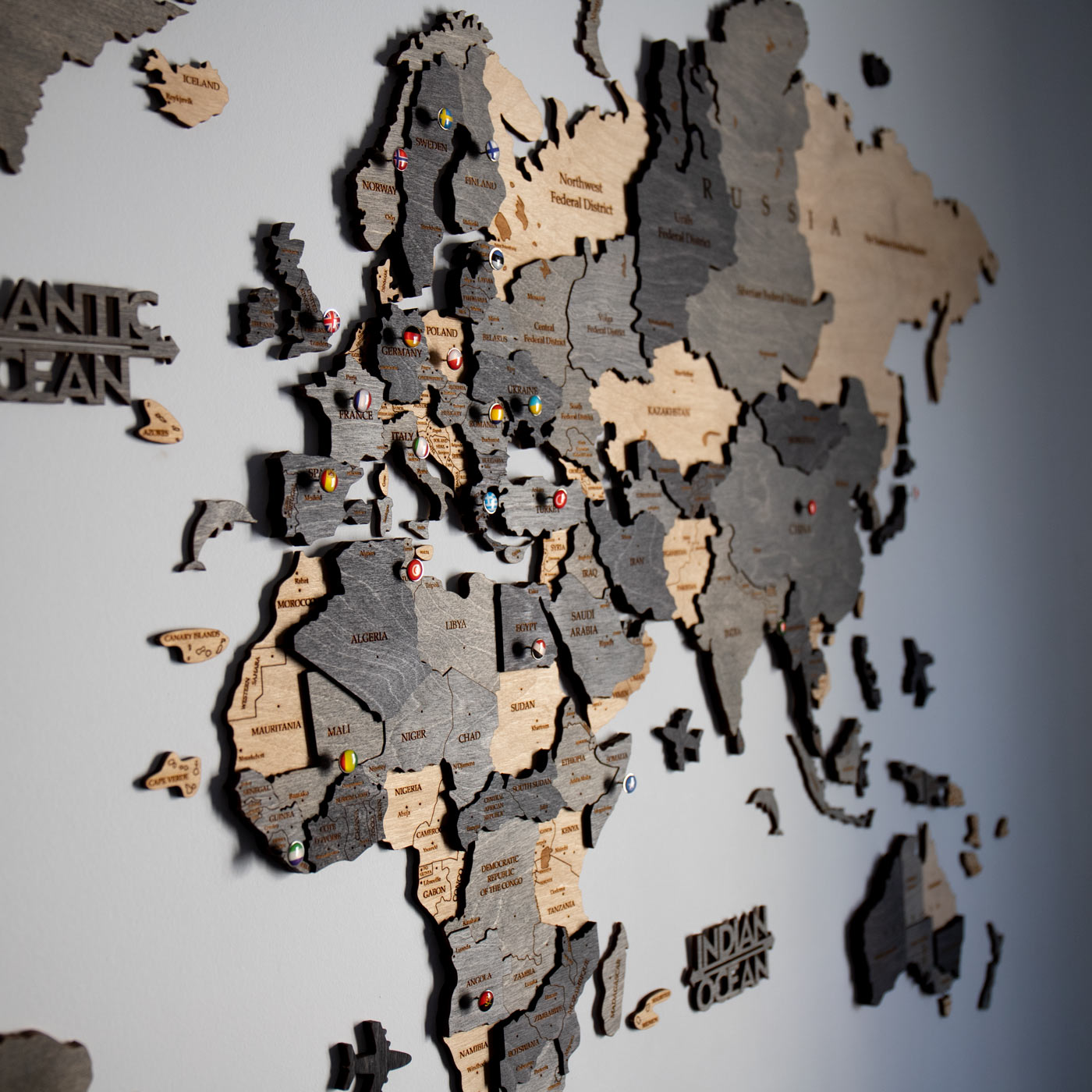 3d wooden world map. Wall wooden decor. Map with gray and beige shades. Ksilart
